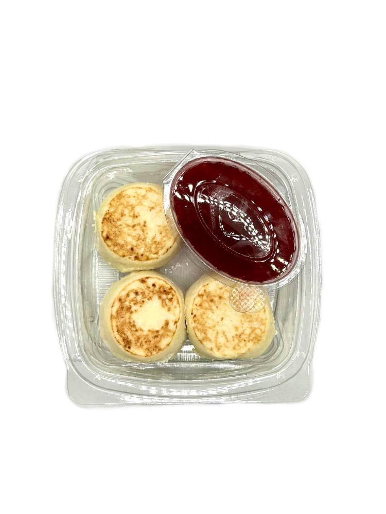 Сирники з соусом брусниця 180г